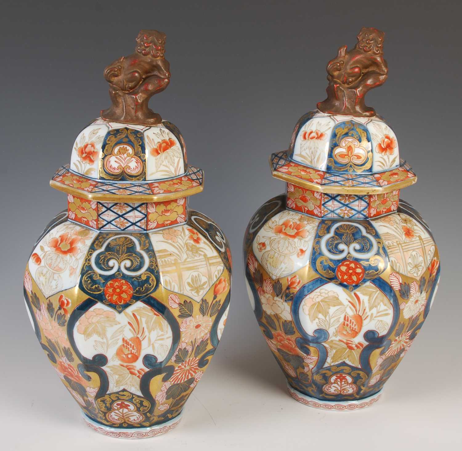 A pair of Japanese Imari porcelain octagonal shaped jars and covers, Meiji Period, decorated with - Image 4 of 10