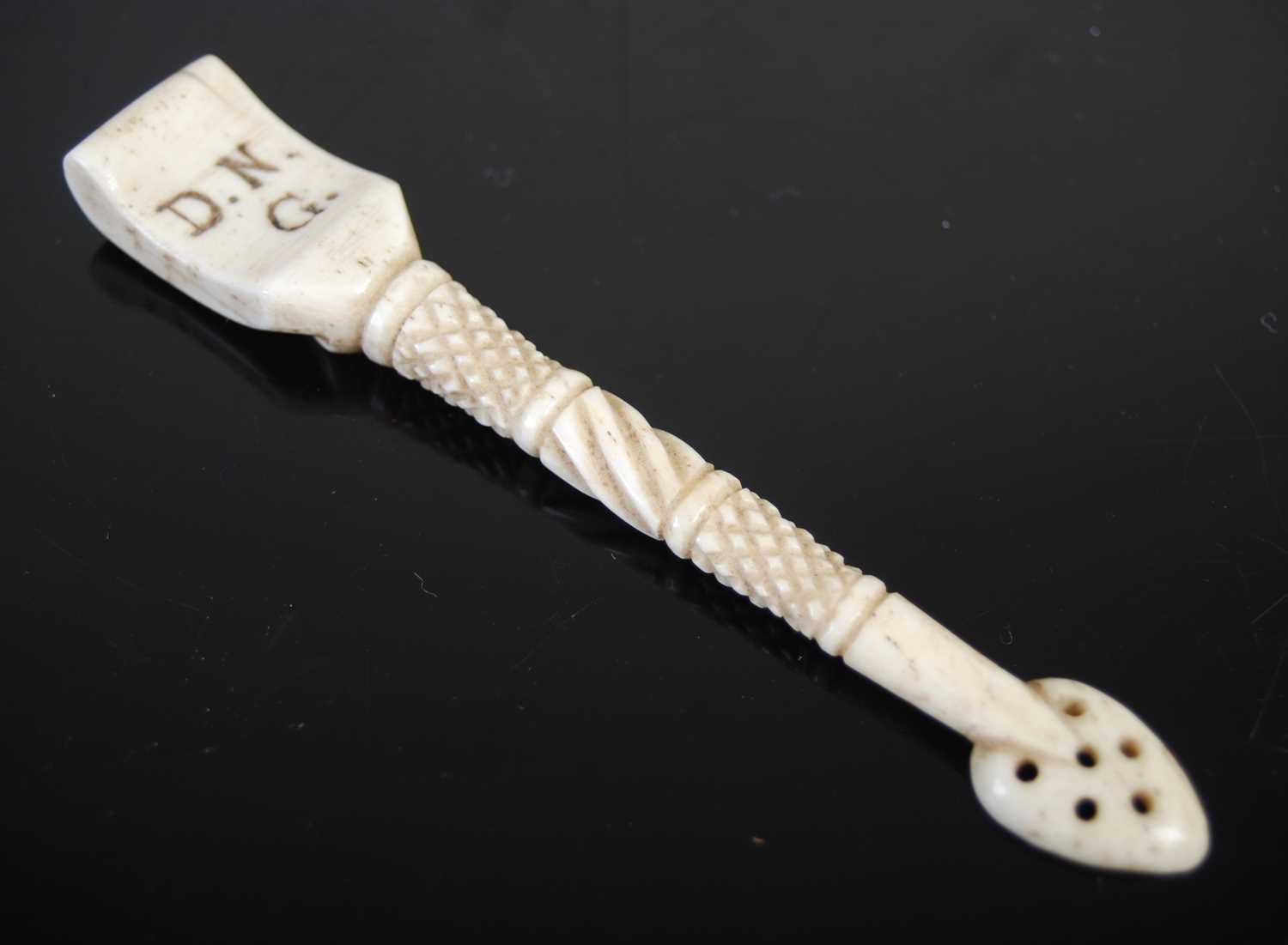 A Scottish large bone snuff spoon with finely carved wrythen-fluted and hatched stem, the spade- - Image 2 of 2