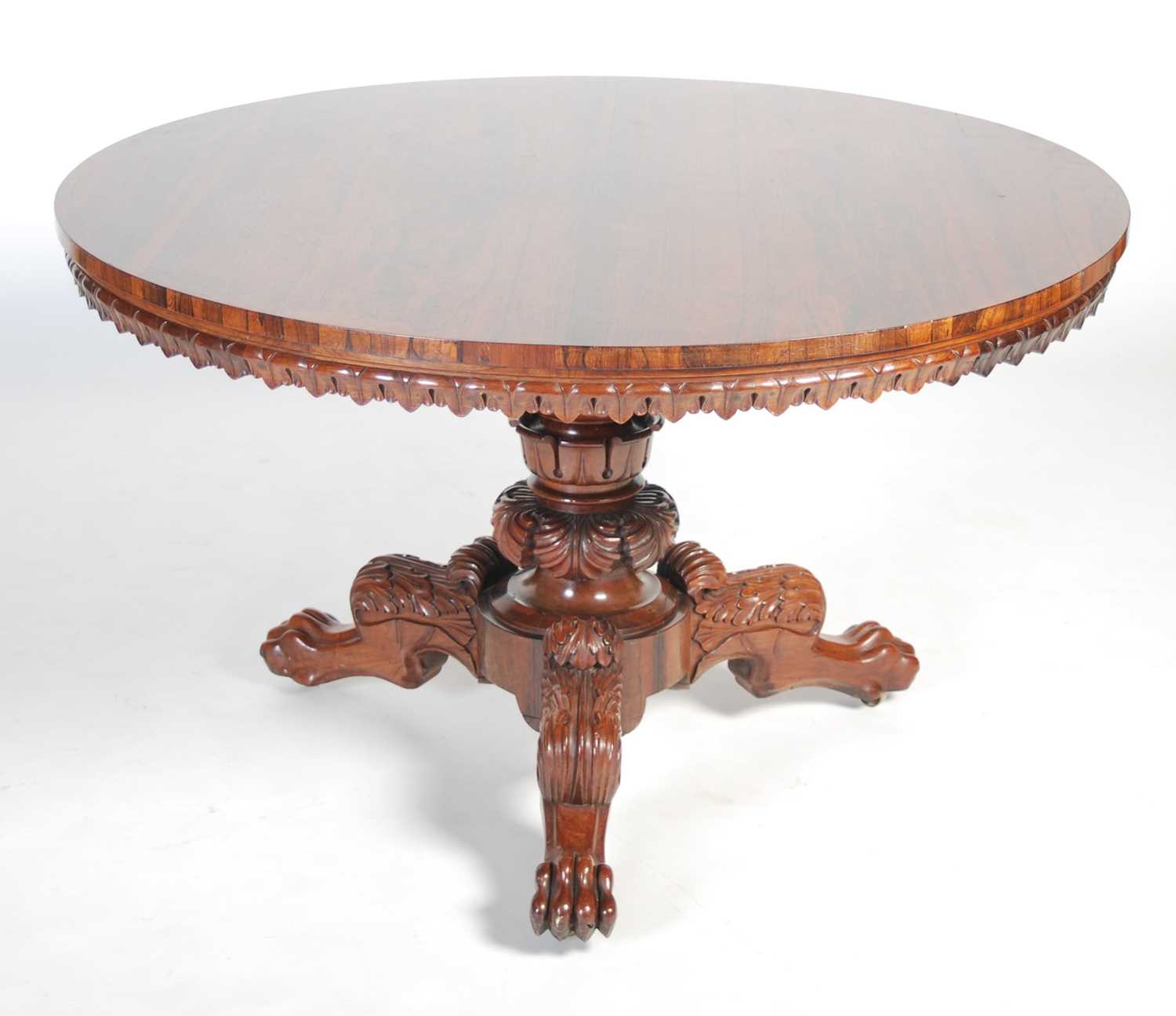 A Regency rosewood snap-top supper table, in the manner of Gillows, the hinged circular top with a - Image 6 of 7
