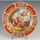 A Vienna porcelain cabinet plate titled 'Venus and Adonis', printed and painted marks, 24.5cm
