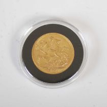 An Edward VII gold sovereign, dated 1903.