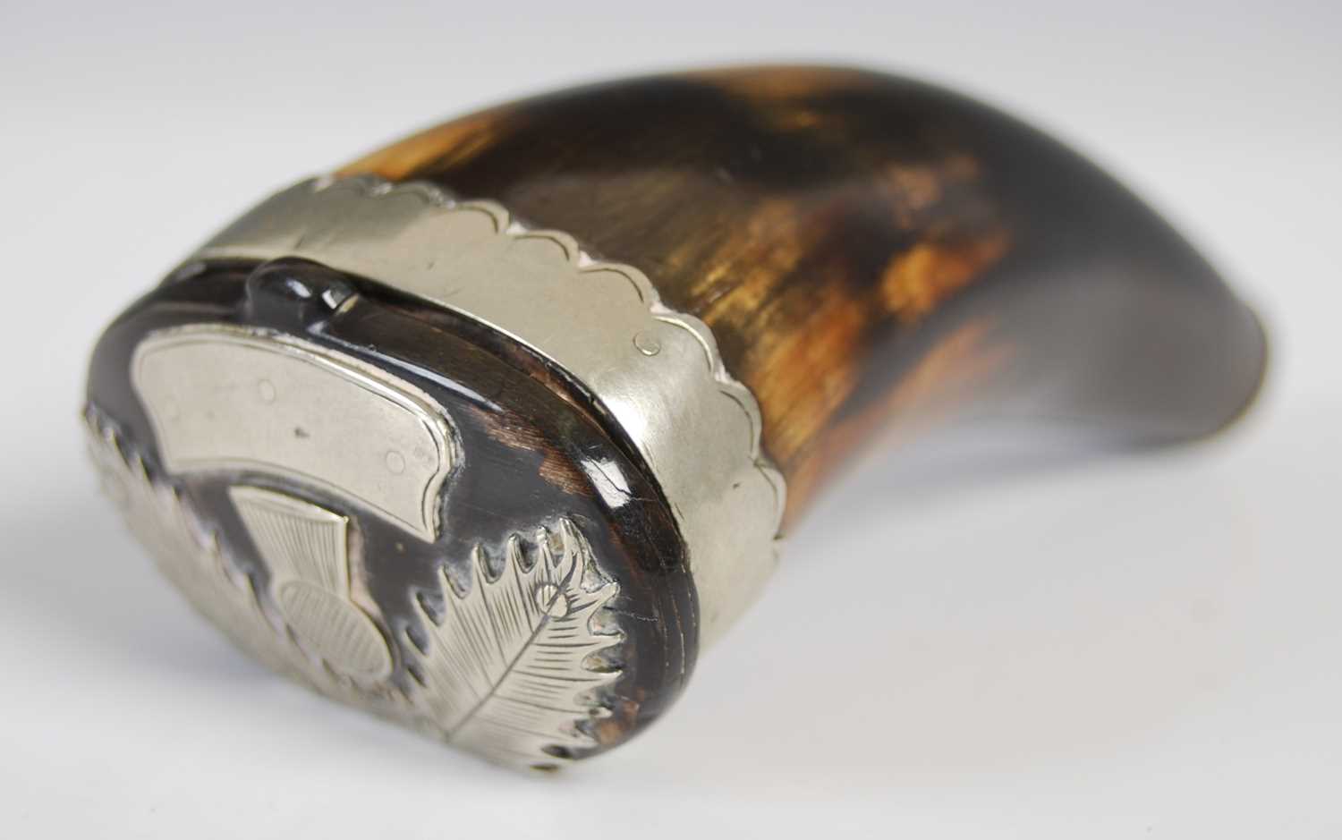 A Scottish curved horn snuff mull with silvered-metal engraved thistle hinge, curved vacant