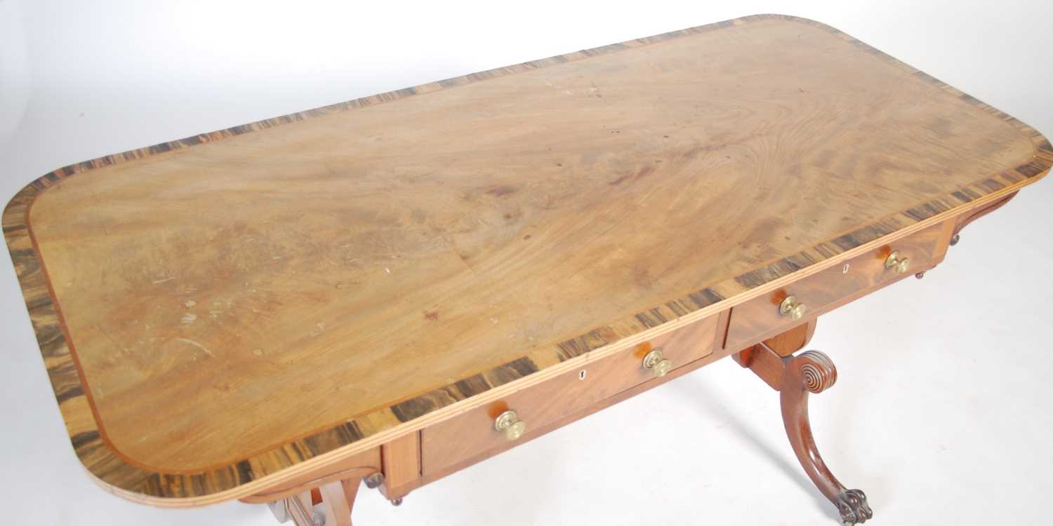 A Regency style mahogany and coromandel centre table, the rounded rectangular top above two frieze - Image 2 of 8