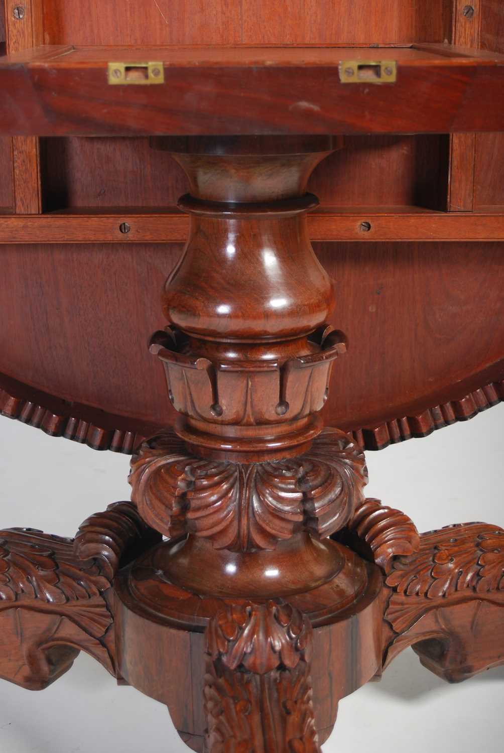 A Regency rosewood snap-top supper table, in the manner of Gillows, the hinged circular top with a - Image 5 of 7