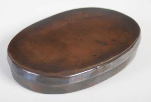 A large patinated copper oval tobacco box, the pull-off cover inscribed ‘R. Whinorey, KENDAL’,