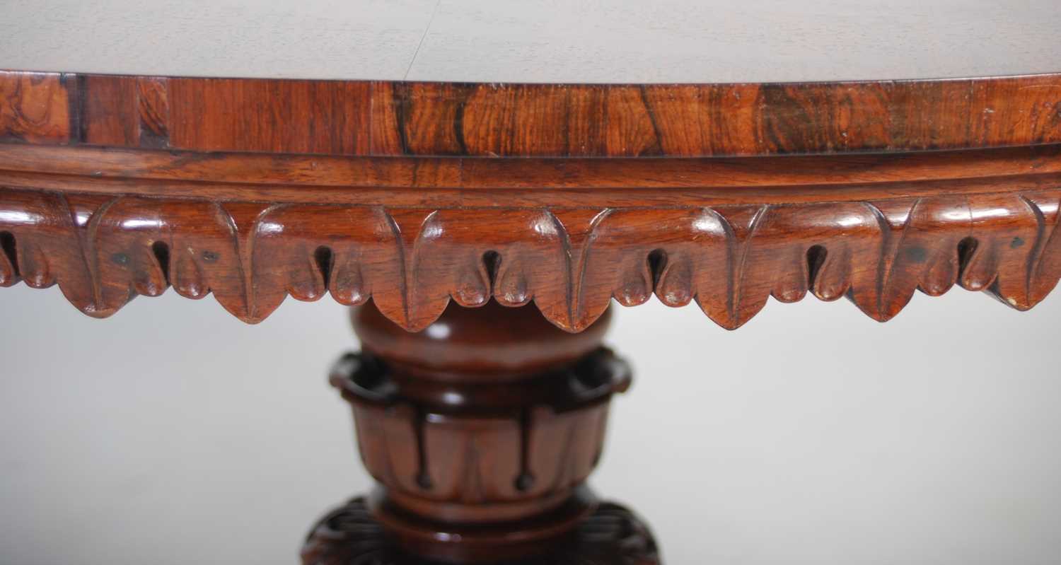 A Regency rosewood snap-top supper table, in the manner of Gillows, the hinged circular top with a - Image 7 of 7