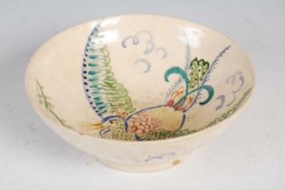 A painted pottery bowl in the style of Roger Fry for the Omega Workshops, decorated with an exotic