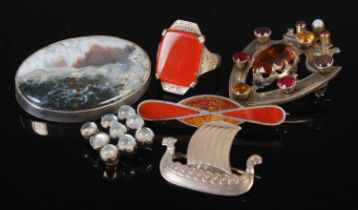 A collection of assorted white metal jewellery, to include a shield shaped brooch set with