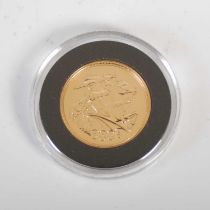 An Elizabeth II gold sovereign, dated 2005.