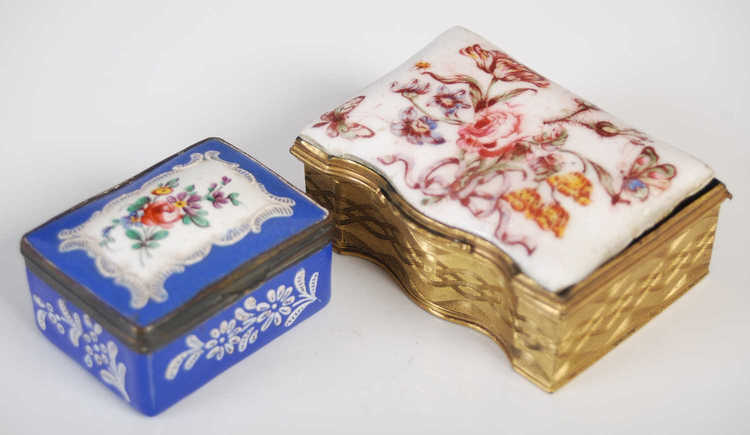 An 18th century blue ground Battersea enamel snuff box, the hinged cover opening to a white enamel