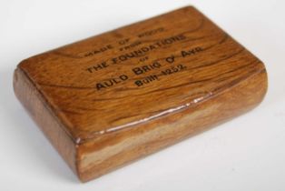 A Scottish treen oblong snuff box, the integral hinged cover inscribed ‘MADE OF WOOD FROM THE