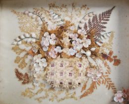 A Victorian dried flower and shell montage, depicting a basket issuing flowers formed from shells