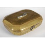 A brass cut-cornered oblong snuff box, the hinged cover engraving with a wine ewer, goblet and