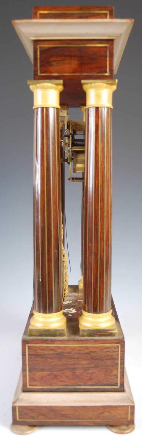 A French Charles X rosewood and brass inlaid Portico clock, the engine turned silvered dial with - Image 7 of 8