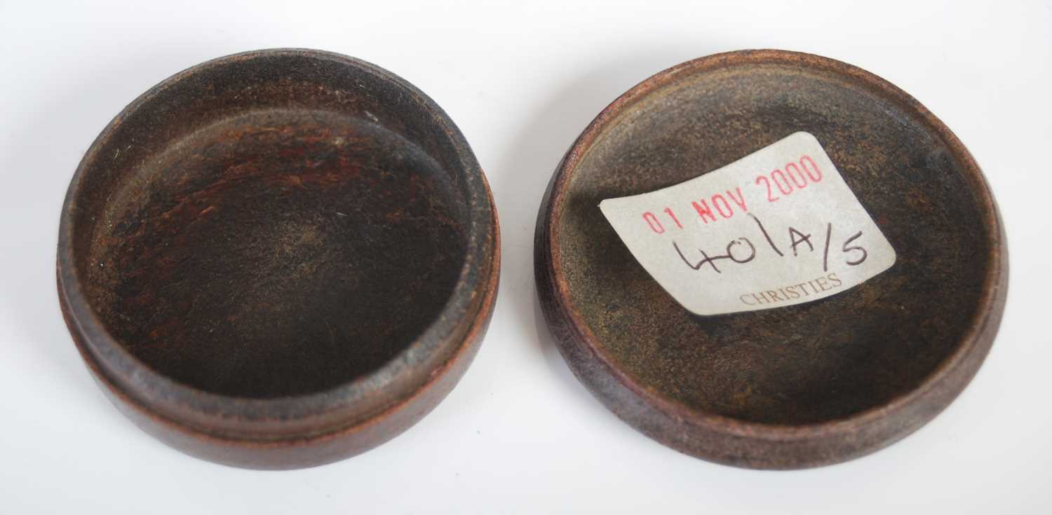 A pressed leather circular snuff box, the detachable cover and base with central rosette and - Image 3 of 3