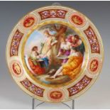 A Vienna porcelain hand-painted cabinet plate titled 'Die Toupe Des Achilles', printed and painted