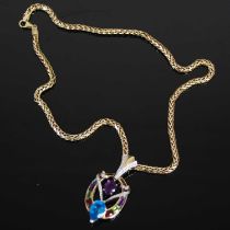 A yellow metal necklace suspending a yellow metal, diamond and coloured stone pendant, set with