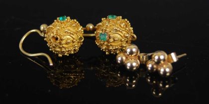 A pair of late 19th century Etruscan style yellow metal and green stone ball shaped drop earrings,