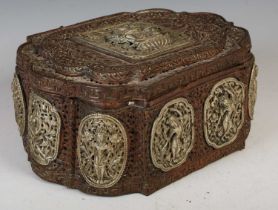 A Tibetan or Nepalese copper and white metal casket, late 19th century, the pierced copper ground