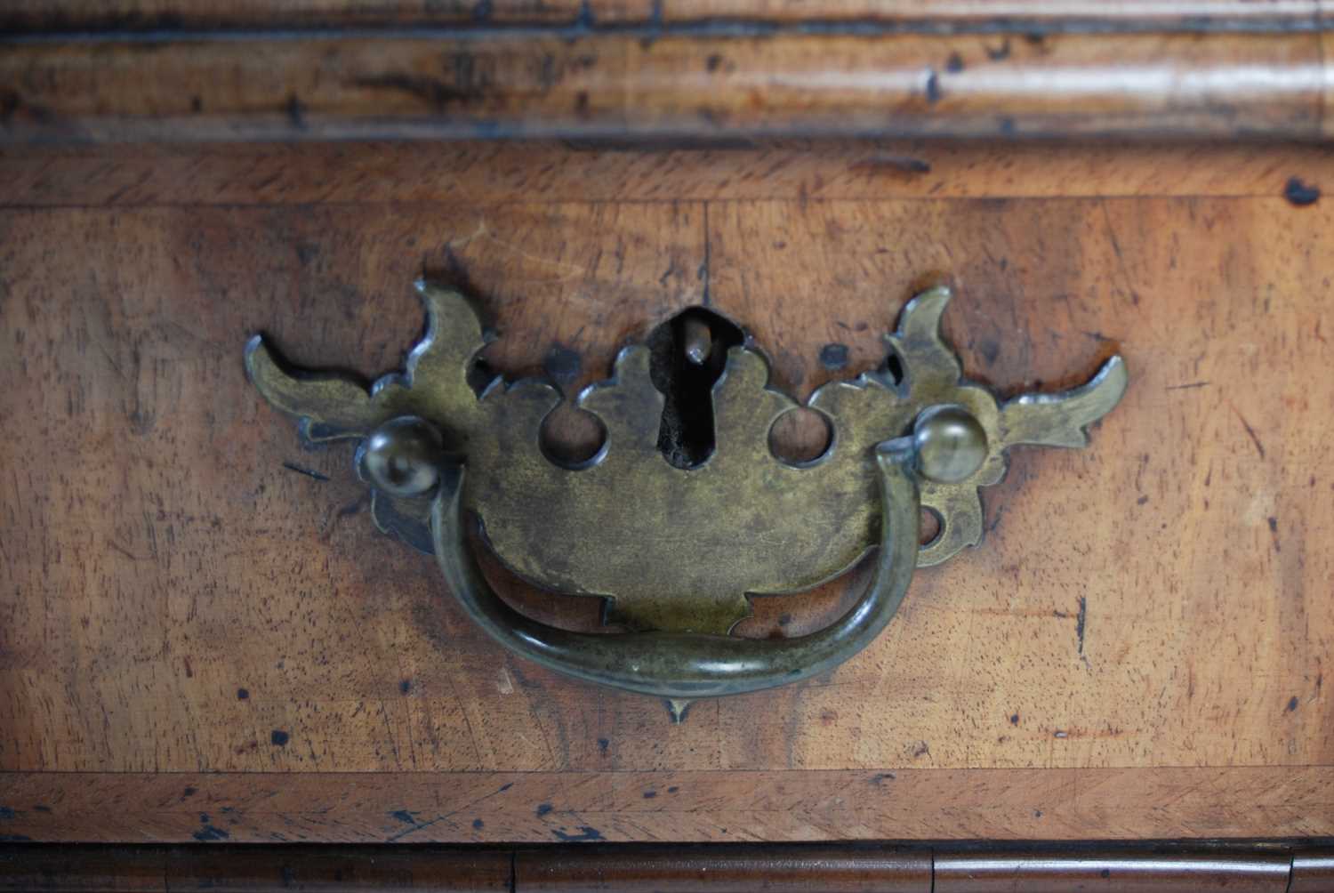 A George II walnut bureau, the rectangular fall-front opening and resting on loppers, to a fitted - Image 7 of 13