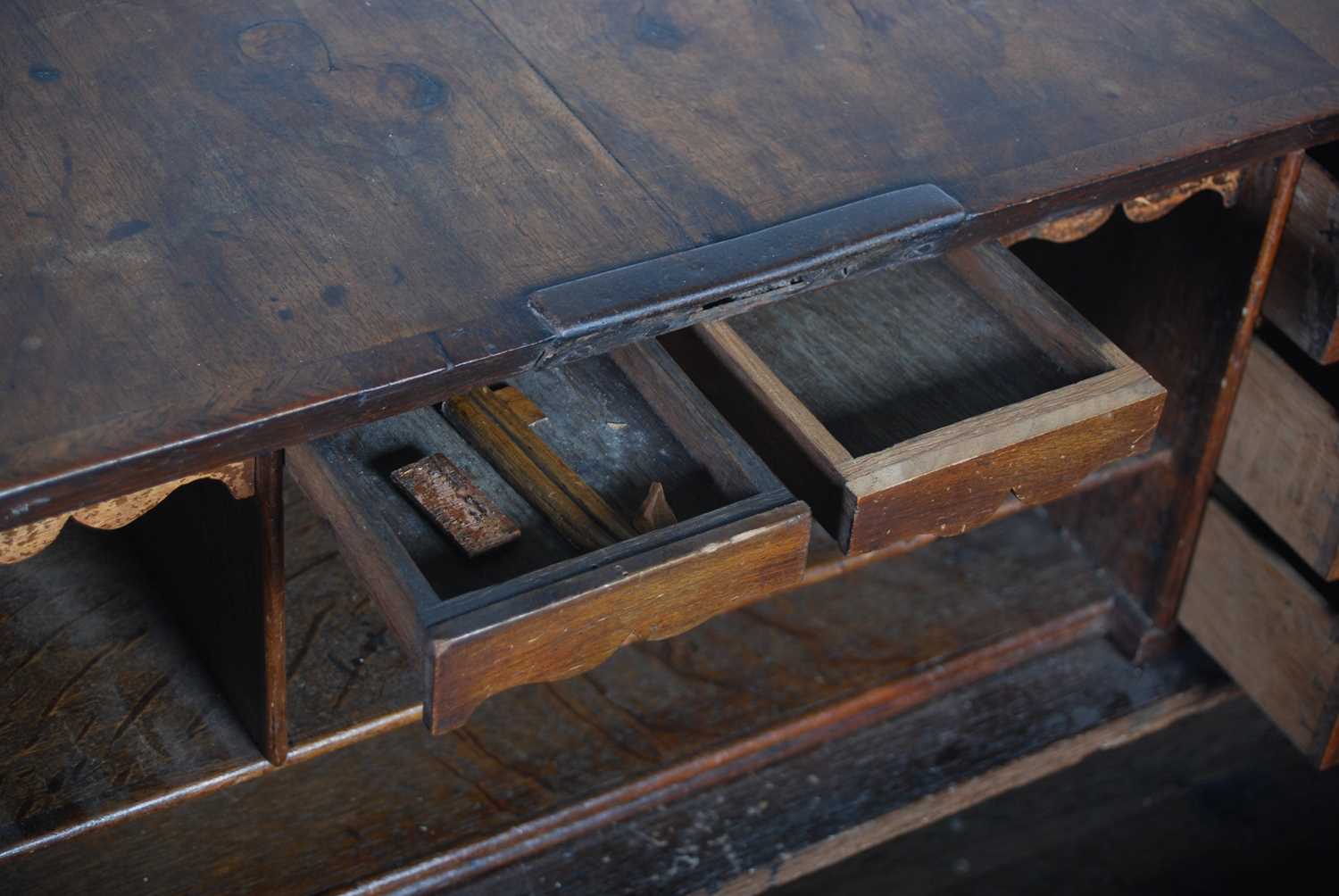 A George II walnut bureau, the rectangular fall-front opening and resting on loppers, to a fitted - Image 12 of 13