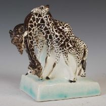 ARR Stella R. Crofts (1898-1964), a ceramic figure group modelled with four giraffes, incised marks,