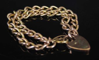 A 9ct gold double chain bracelet, with heart-shaped lock, approximately 17cm long, gross weight 36.2