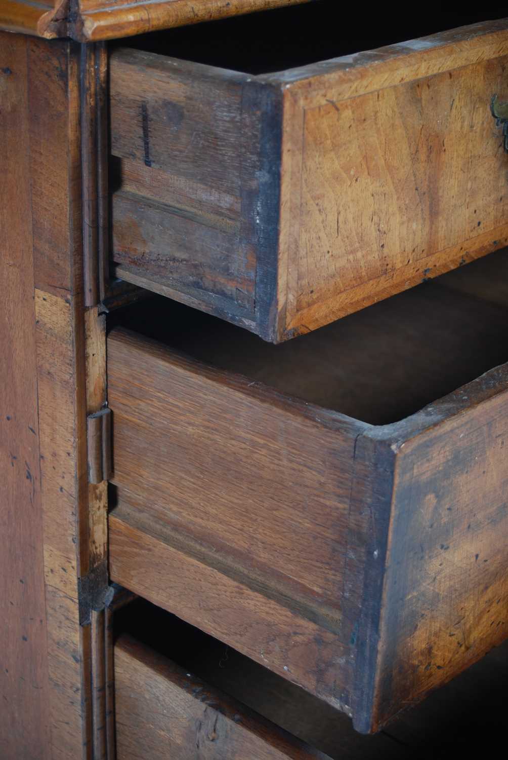 A George II walnut bureau, the rectangular fall-front opening and resting on loppers, to a fitted - Image 9 of 13