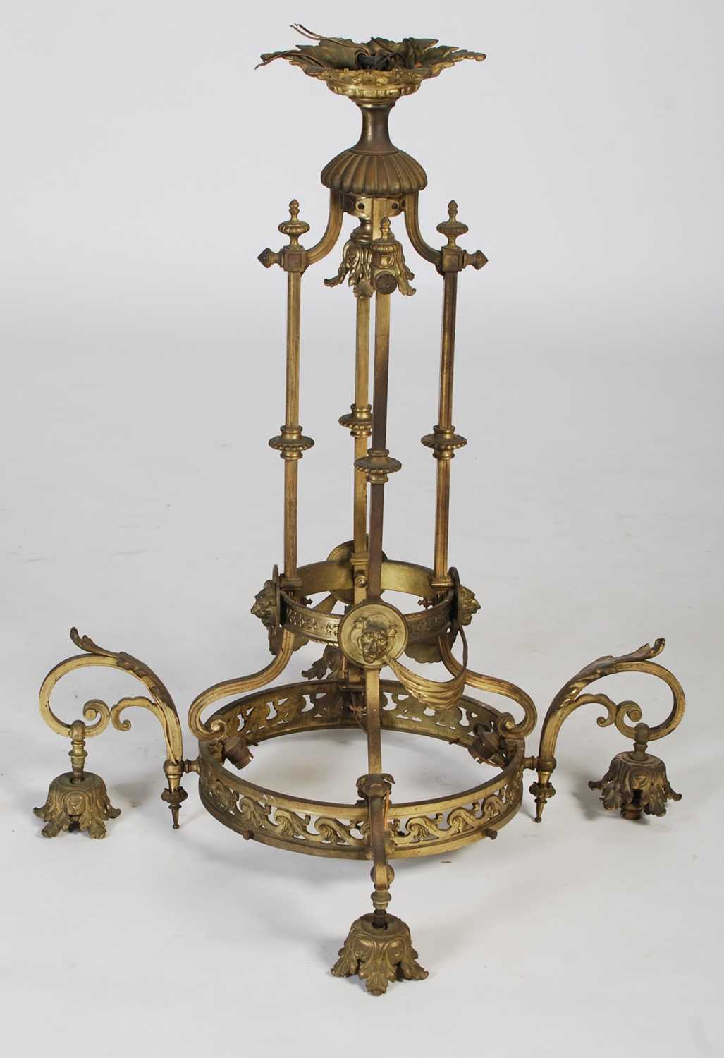 A late 19th/ early 20th century brass four-light hanging chandelier, set with four foliate cast - Image 6 of 6