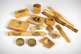 A collection of Mauchline Ware, to include a cylindrical powder box and cover decorated with '