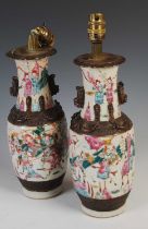 A pair of Chinese porcelain famille rose crackle glazed Warrior vases converted to table lamps, Qing