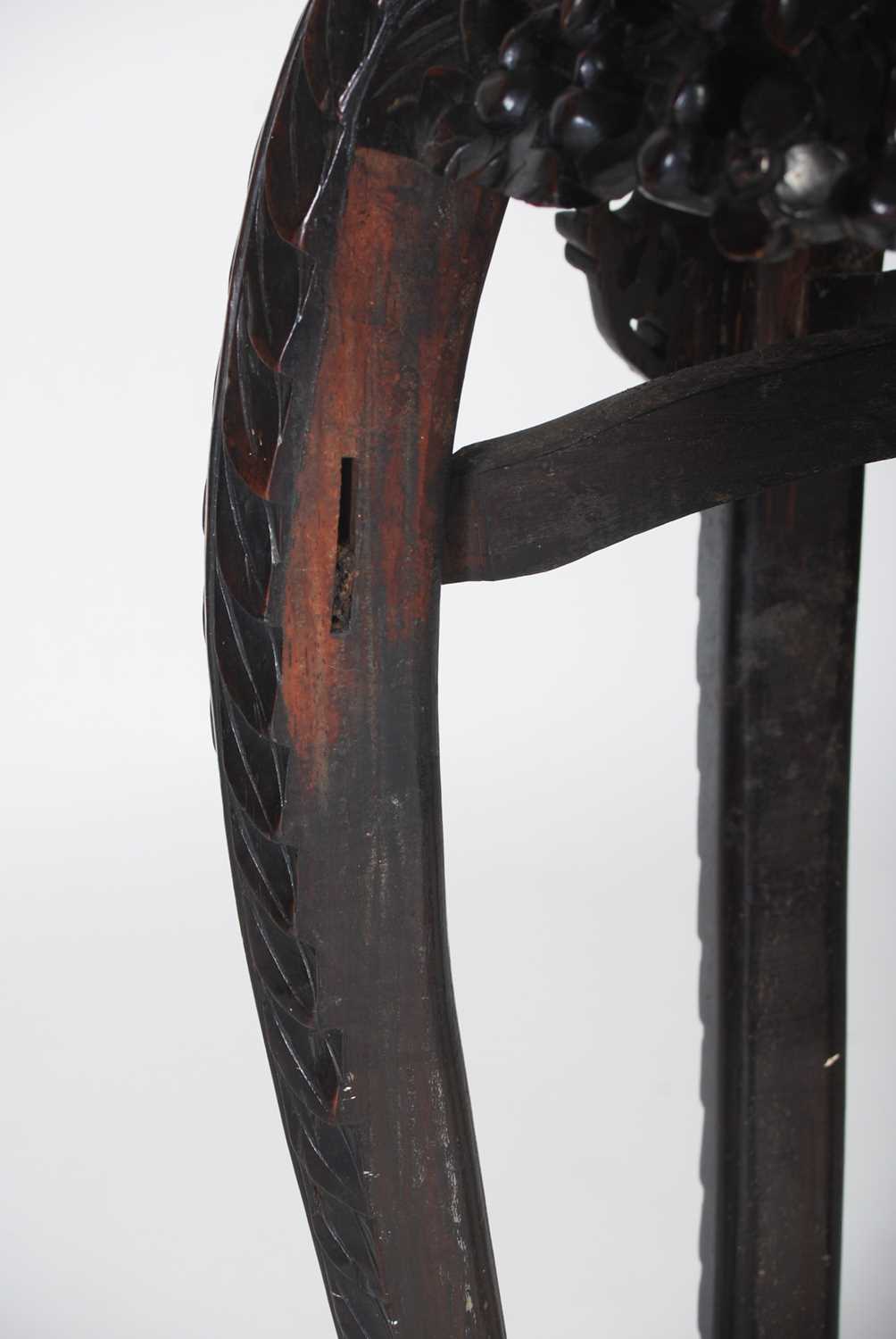 A Chinese dark wood urn stand, late 19th/ early 20th century, the octagonal-shaped top centred - Image 6 of 7