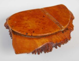 A Scottish burr wood snuff box with integral hinge, richly grained cover and base of naturalistic