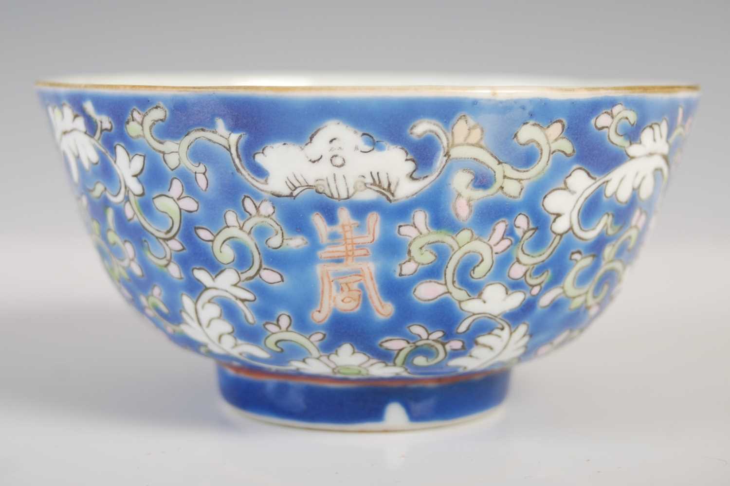 A Chinese porcelain blue ground footed bowl, late 19th/ early 20th century, decorated with lotus - Image 3 of 6