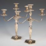A pair of Edwardian silver three-light candelabra, Sheffield, 1904, makers mark of Hawksworth Eyre &
