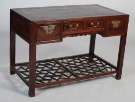 A Chinese dark wood side table/ dressing table, early 20th century, the rectangular panelled top