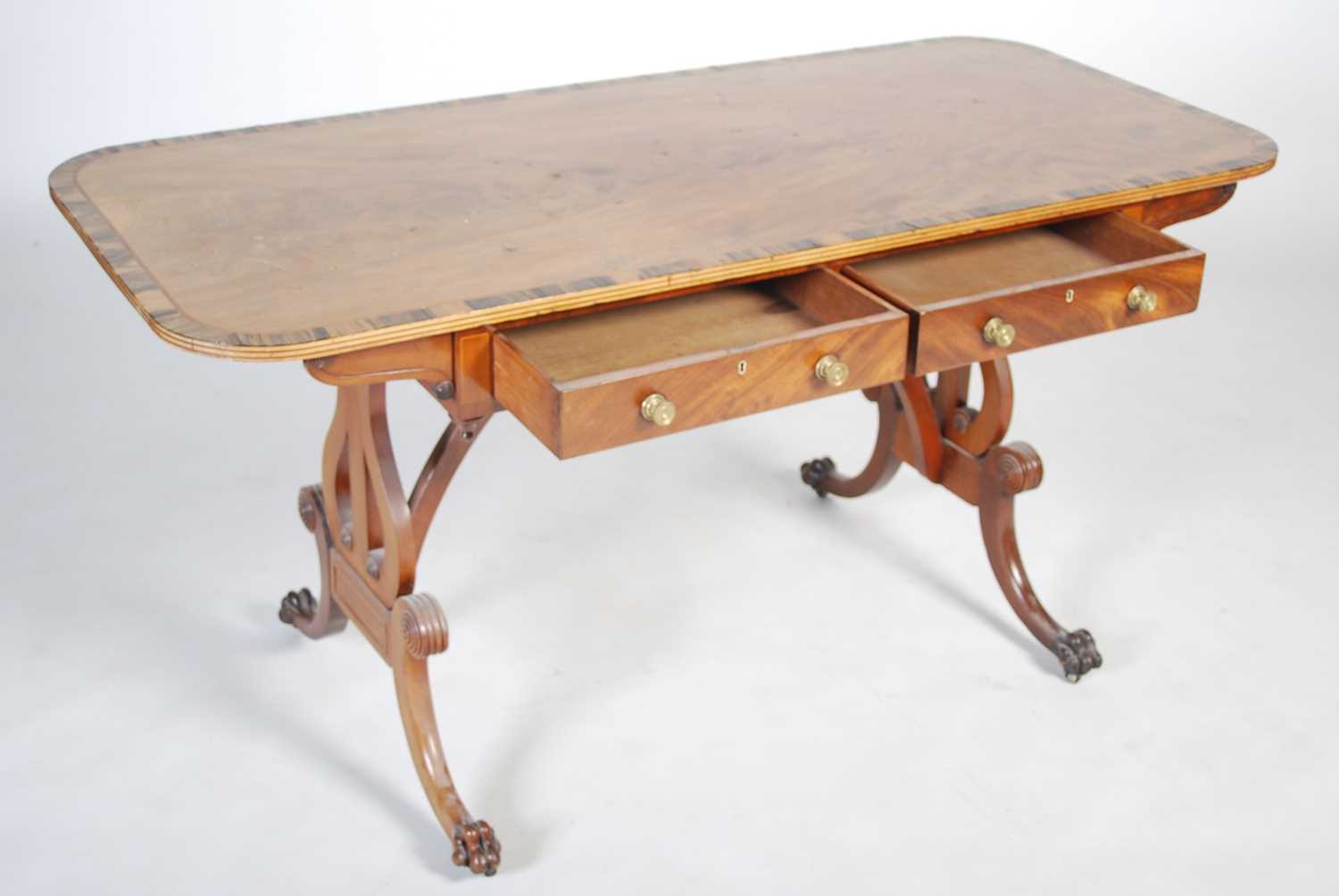 A Regency style mahogany and coromandel centre table, the rounded rectangular top above two frieze - Image 6 of 8