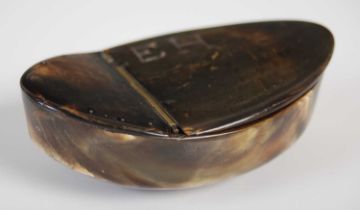 A Scottish horn boat-shaped snuff box, the three-quarter hinged cover deeply carved with initials ‘