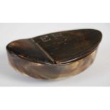 A Scottish horn boat-shaped snuff box, the three-quarter hinged cover deeply carved with initials ‘