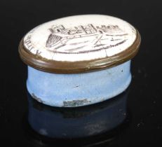 An 18th century Battersea enamel oval patch box, the hinged oval cover inscribed 'A Trifle from