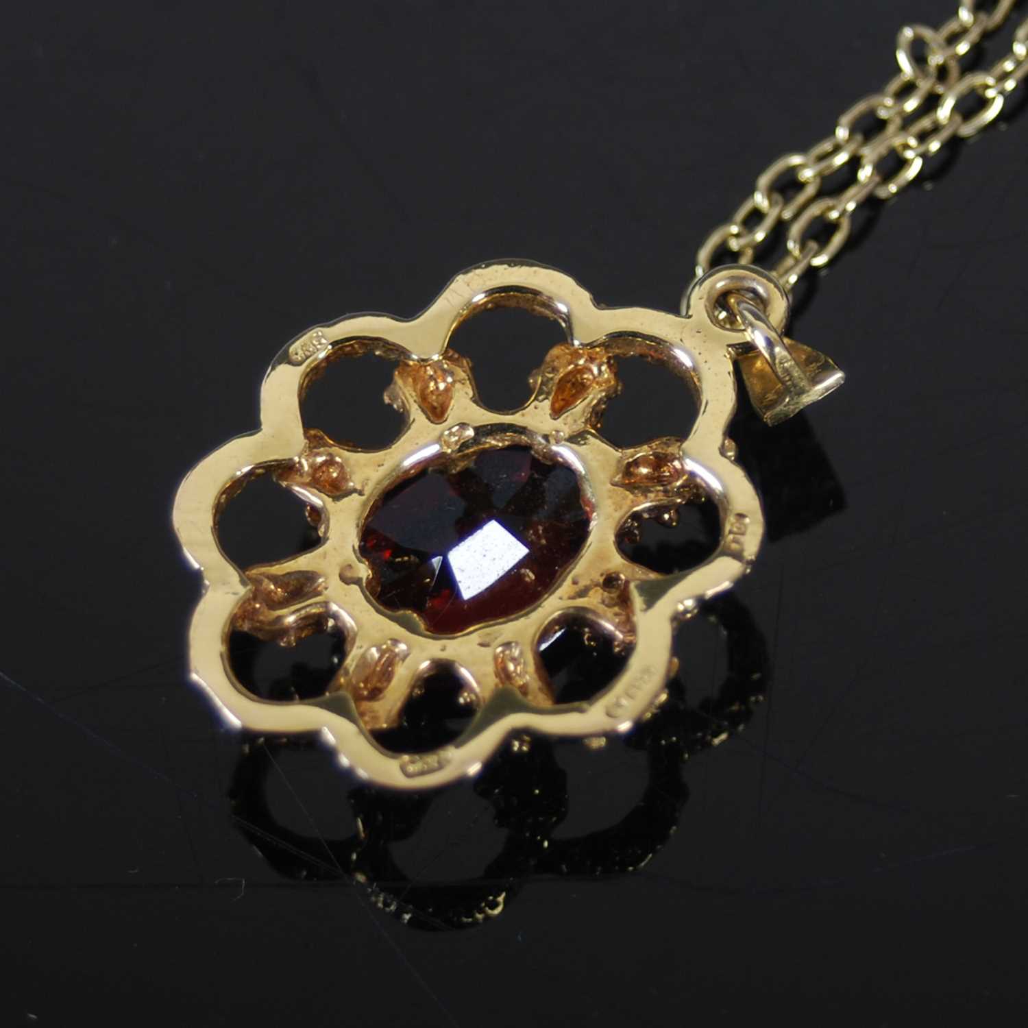A 9ct gold and garnet set pendant suspended on a gold-plated necklace, together with a pair of 9ct - Image 4 of 6