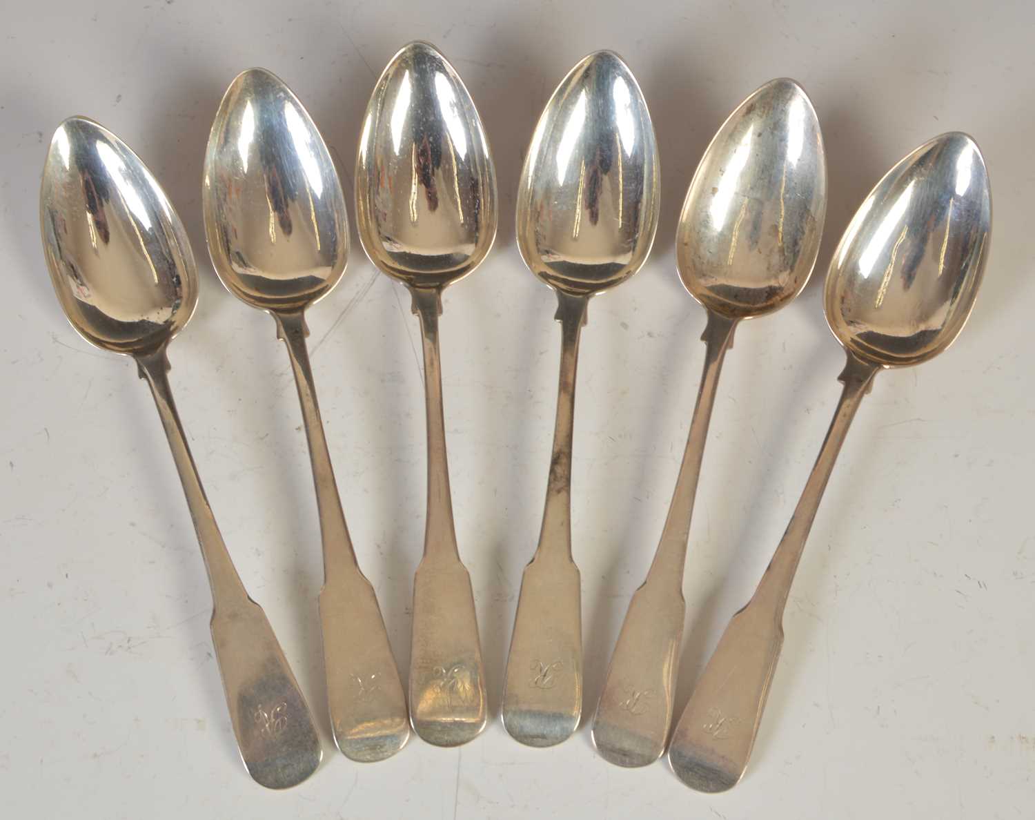 A set of six early 19th century Scottish Provincial silver dessert spoons, Perth, makers mark of