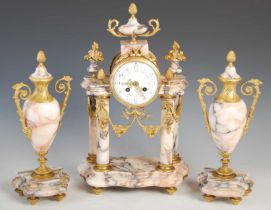 A late 19th century marble and gilt metal mounted clock garniture, the clock with circular enamel