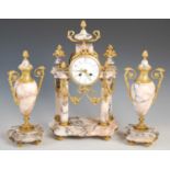 A late 19th century marble and gilt metal mounted clock garniture, the clock with circular enamel