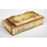 An unusual Scottish large horn snuff box formed as a book with curved spine and detachable cover,