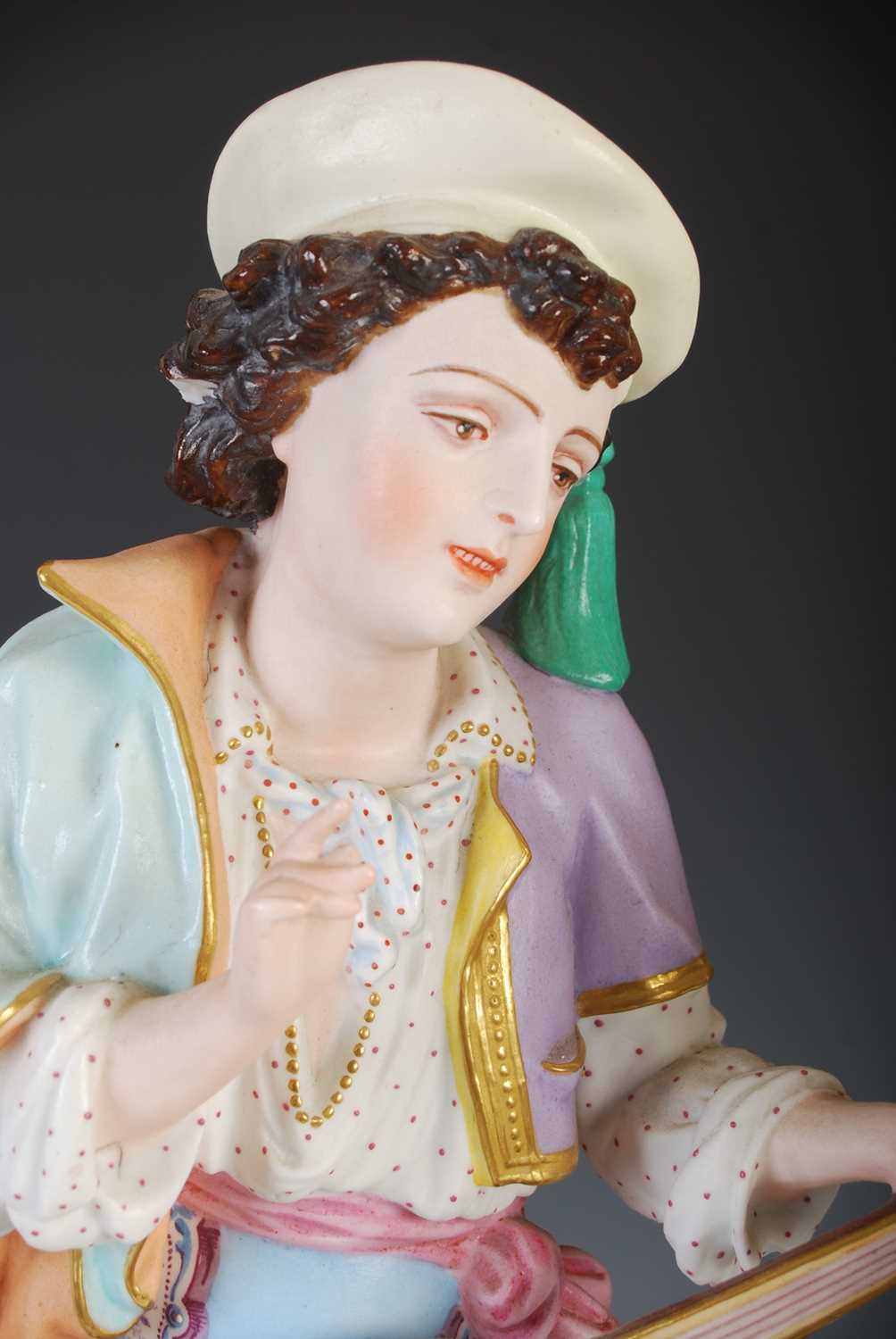 A pair of late 19th century French Bisque porcelain figures, modelled as a boy playing the - Image 3 of 9