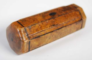 An unusual octagonal cylindrical burr yew wood snuff box with black penwork edges, one end sliding