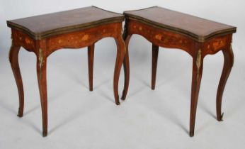 A pair of late 19th century rosewood, marquetry and gilt metal mounted card tables, the hinged