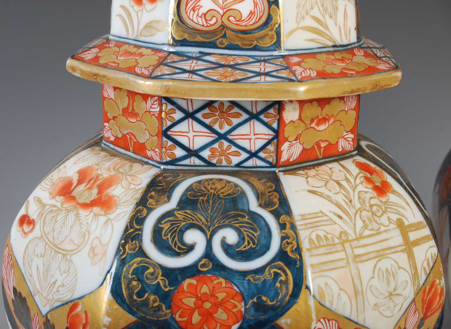 A pair of Japanese Imari porcelain octagonal shaped jars and covers, Meiji Period, decorated with - Image 3 of 10