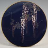 A Japanese silver wire work cloisonné circular dish, 20th century, decorated with wisteria with